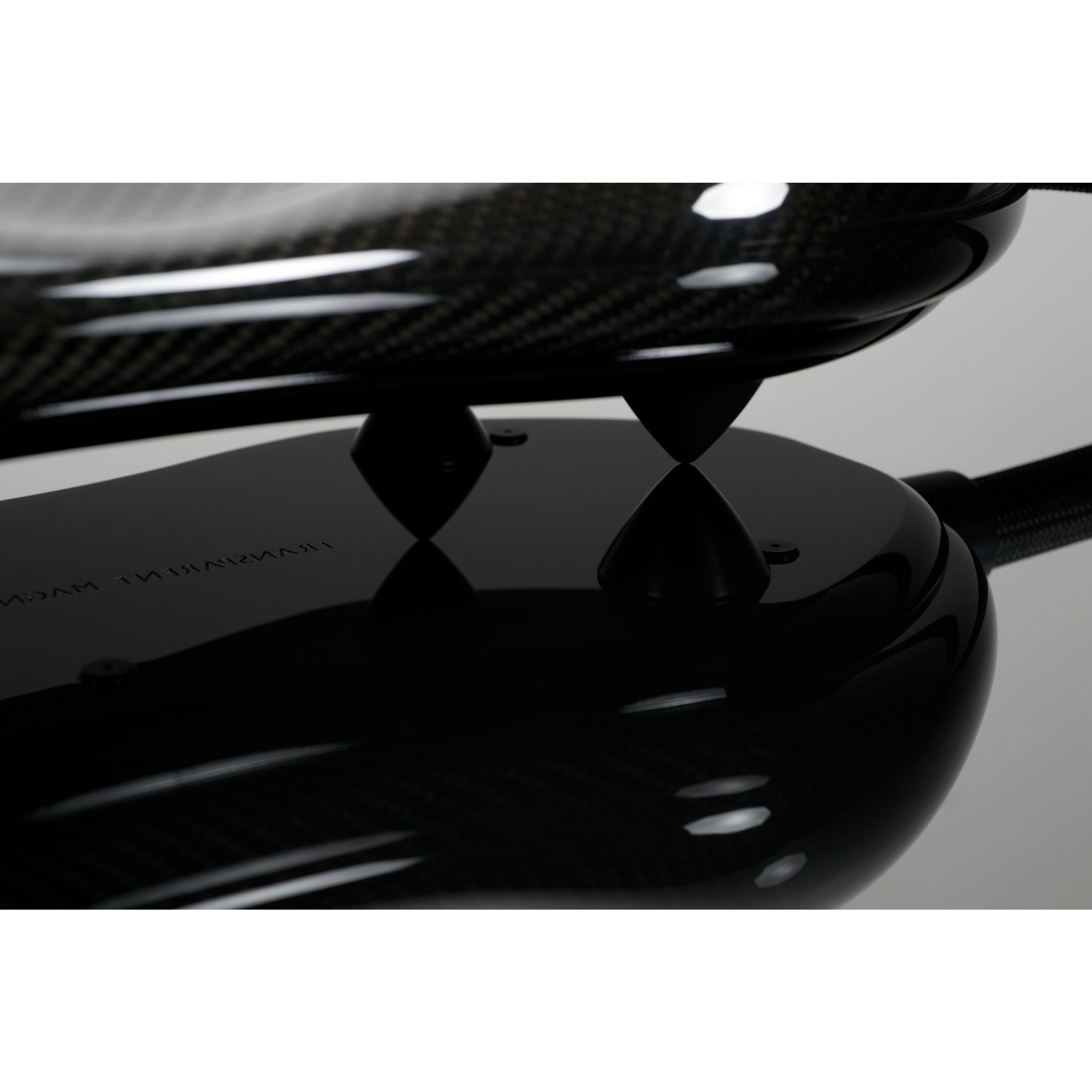 Transparent Magnum Opus Speaker Cable Carapace Feet