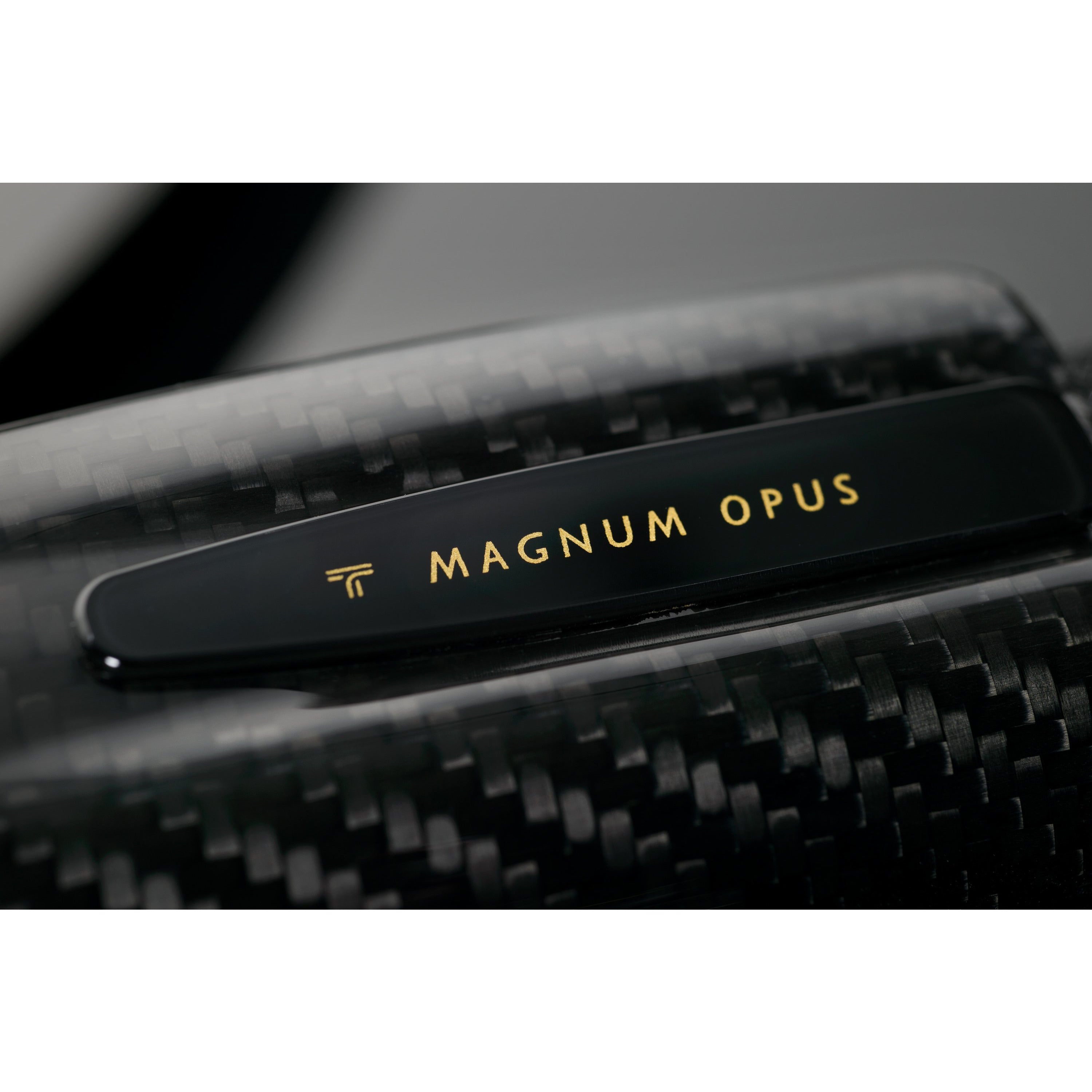 Transparent Magnum Opus Speaker Cable Closeup Logo